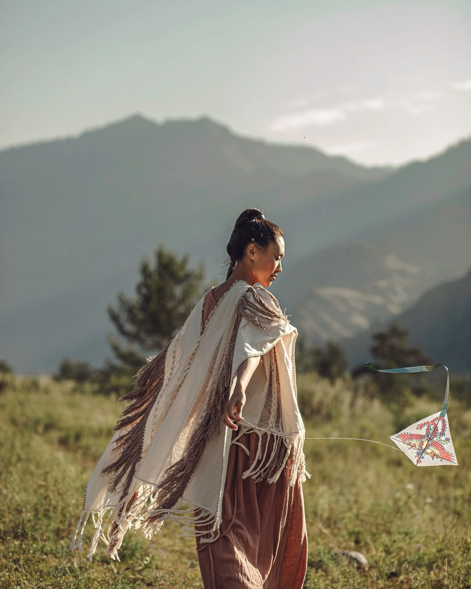 Unique Off-White Boho Poncho with Hand Loomed Tassels - Image 11